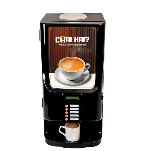 A black instant tea machine with a digital display, buttons for operation, and a cup of tea visible at the top. The machine has a sign with 'CHAI HAI' branding.
